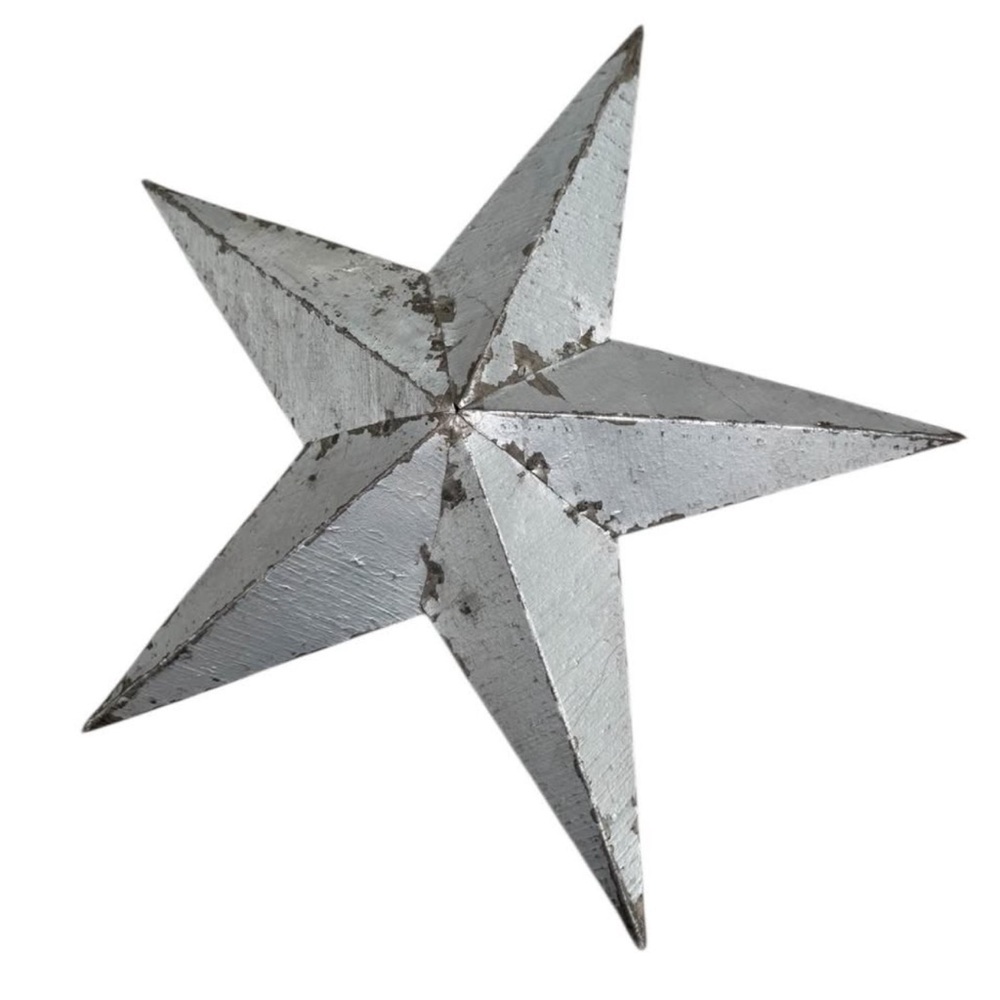 Anthropologie metal star. Measures 18” x 18”.